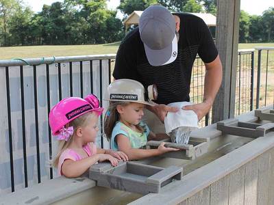 two girls mining for gemstones