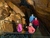 Group of Indiana Cave visitors standing by waterfall