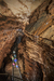 Visitors standing inside cave